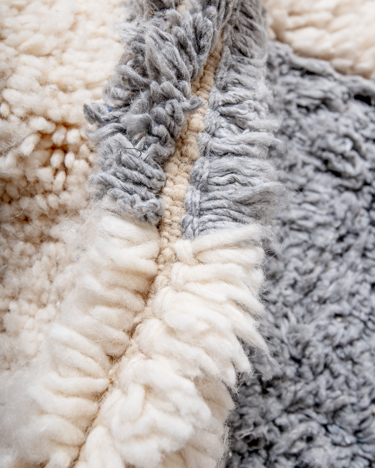 Modern, designer, handcrafted Berber rug from Morocco. Beniourain carpet with beautiful colours and patterns and fluffy wool texture.